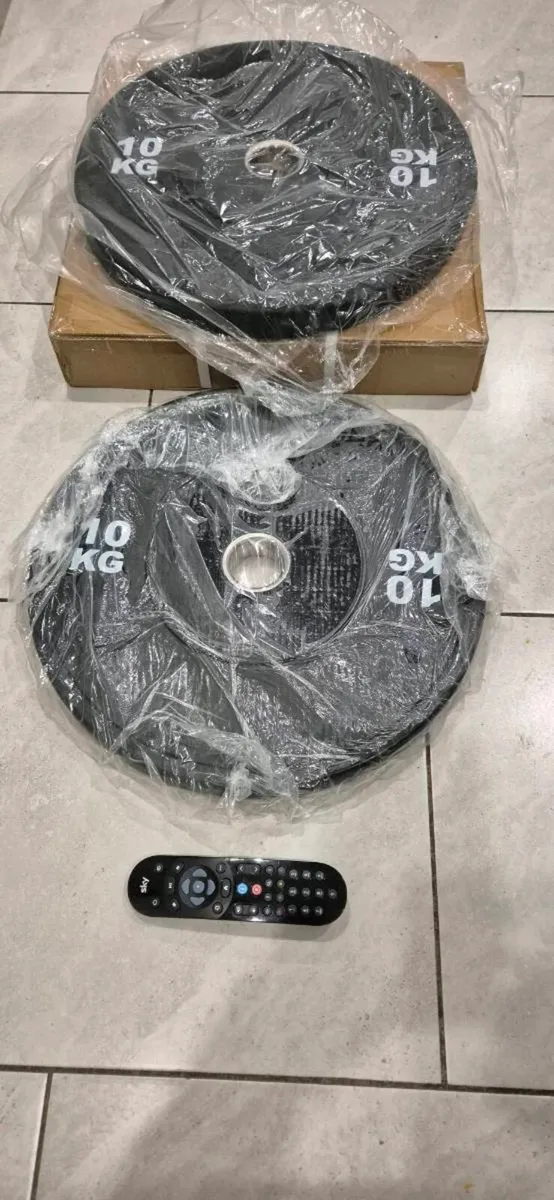 Brand new 2x10 kilo olympic bumper weight plates - Image 1