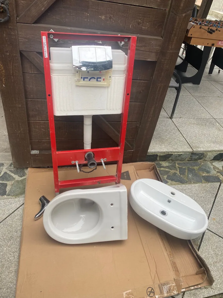 Toilet and sink - Image 1