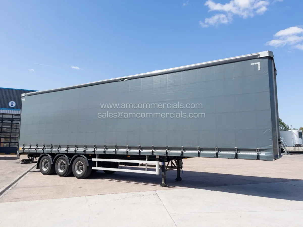 2024 SDC 4678MM Curtain Side Tri Axle Trailer - Image 1