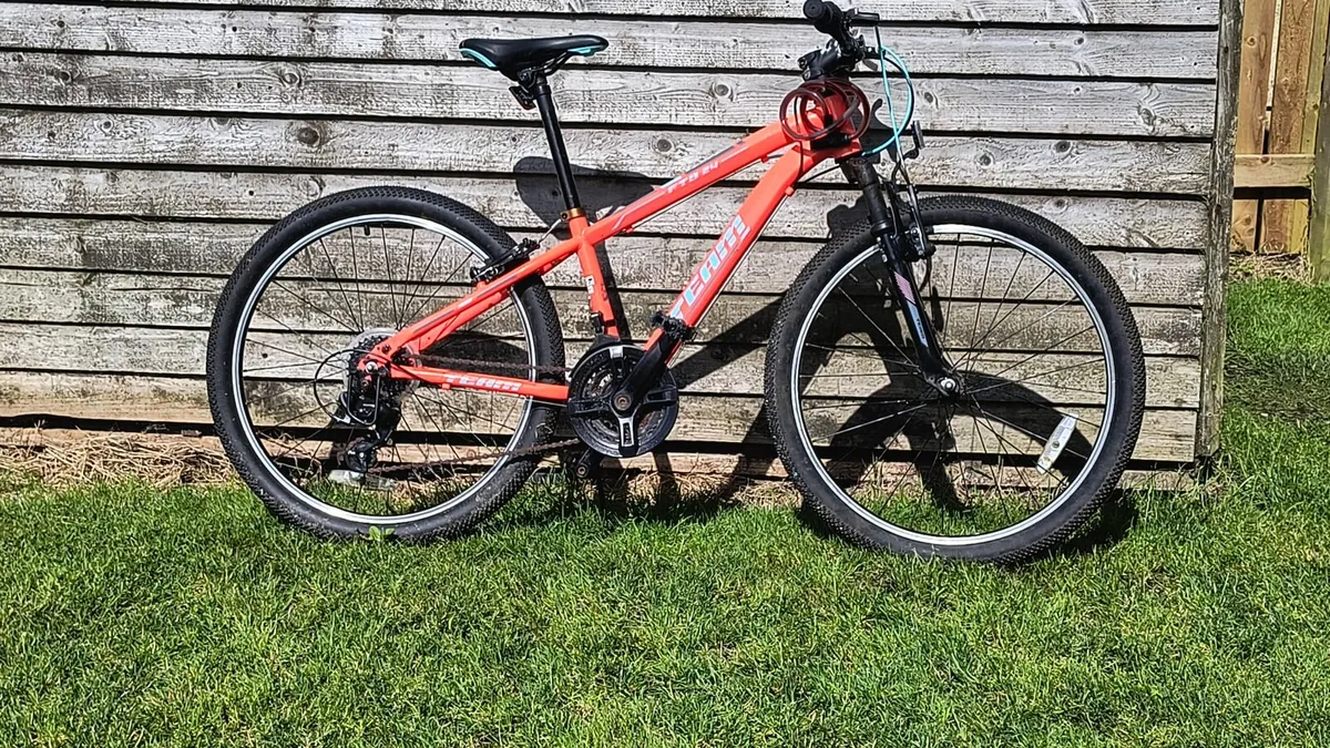 Teenage mountain bike with 24-inch wheels. - Image 1