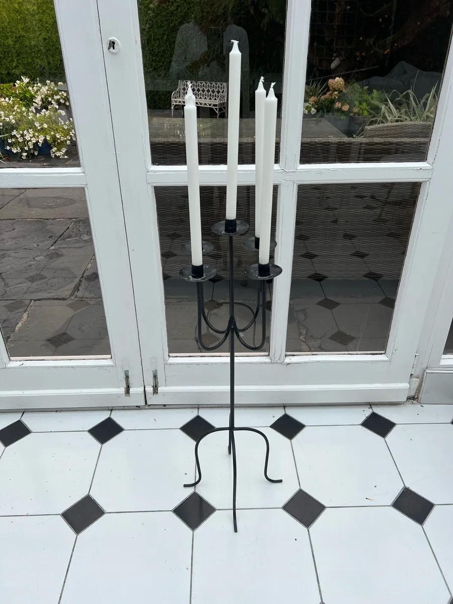 Iron candle holder