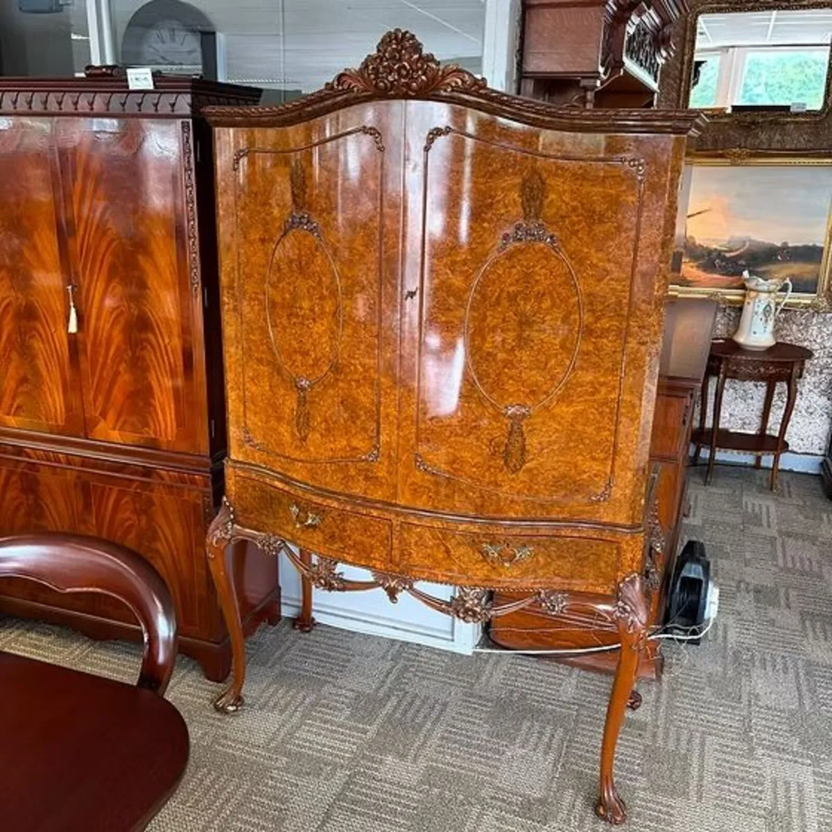 Queen Anne Revival burr walnut cocktail cabinet, b