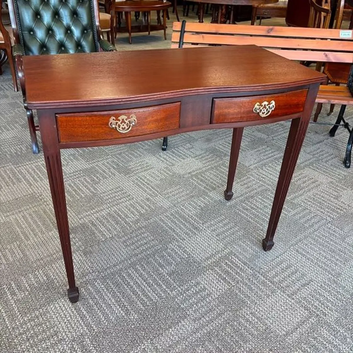 Edwardian mahogany bow ended console table & two d