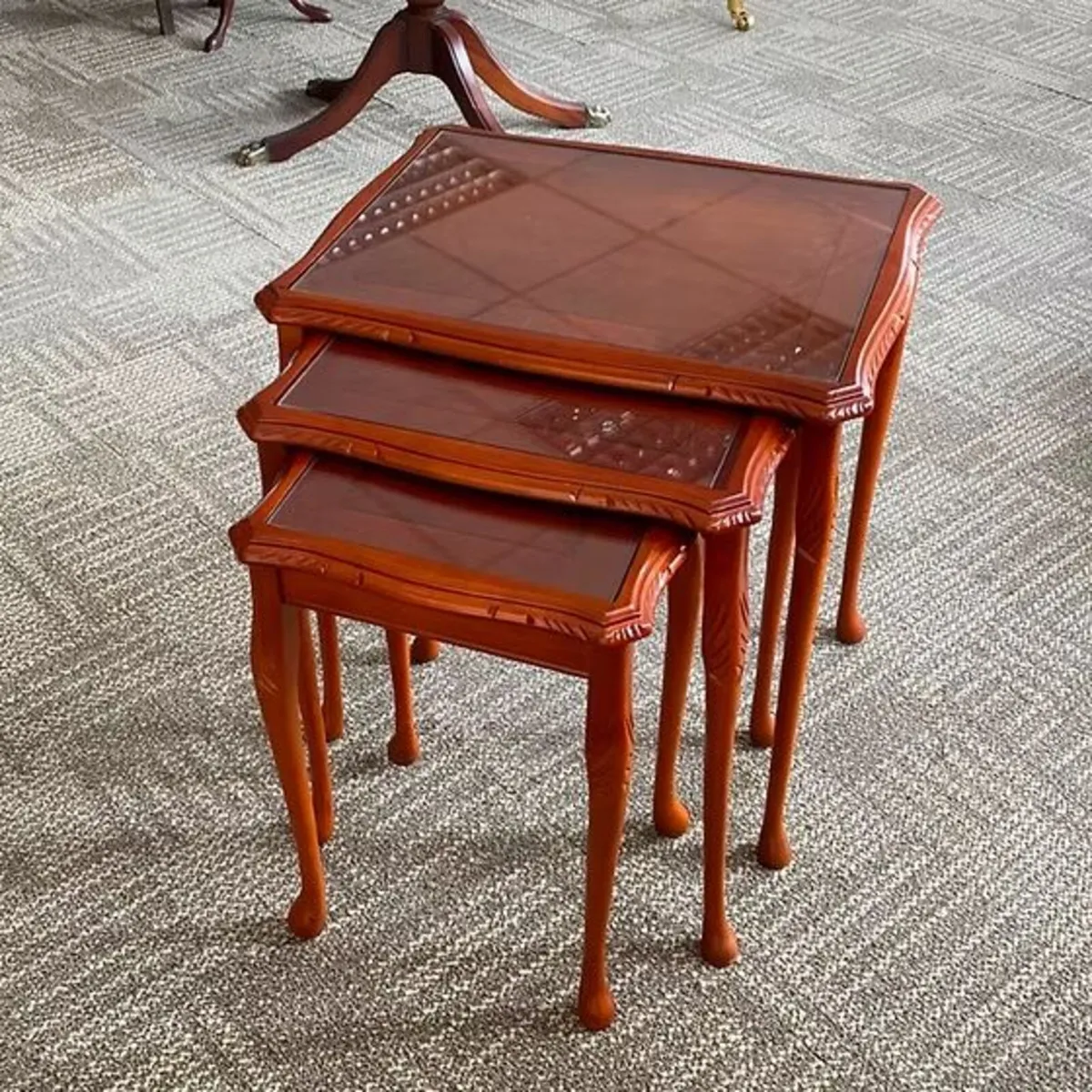 Beautiful set of 3 glass top nest of tables