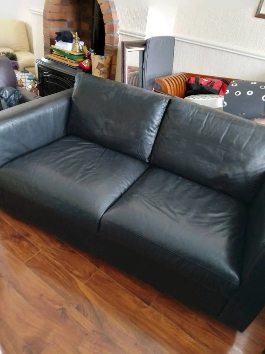 Two seater black leather couch
