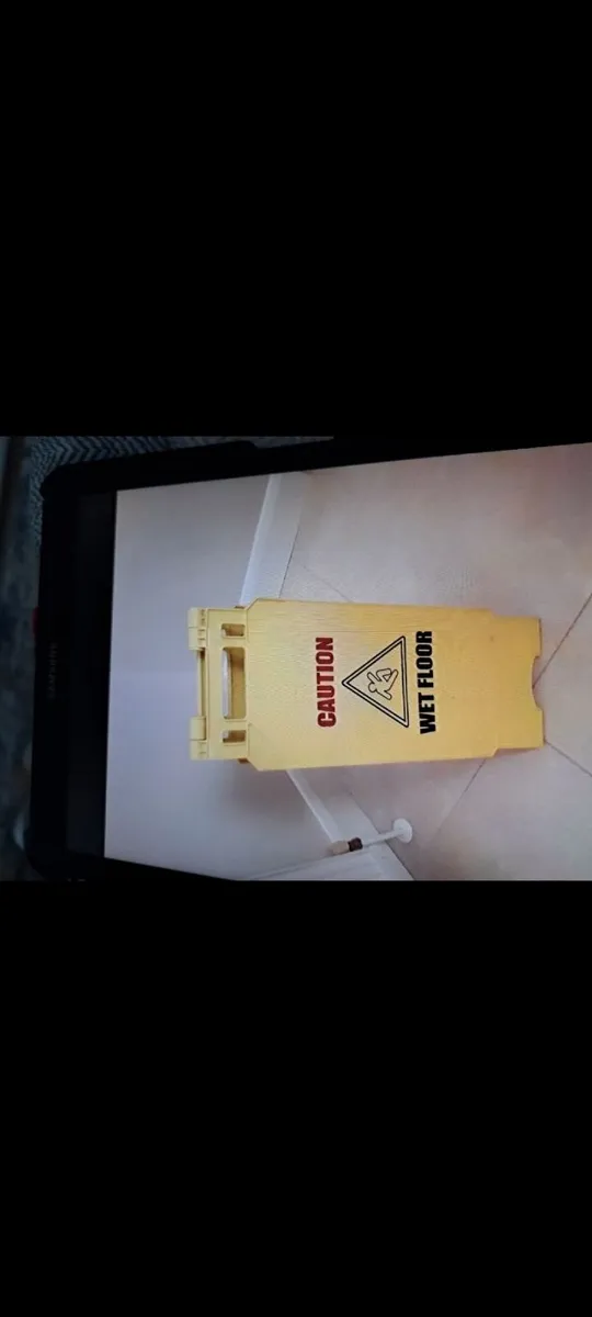 2.    wet floor signs as new