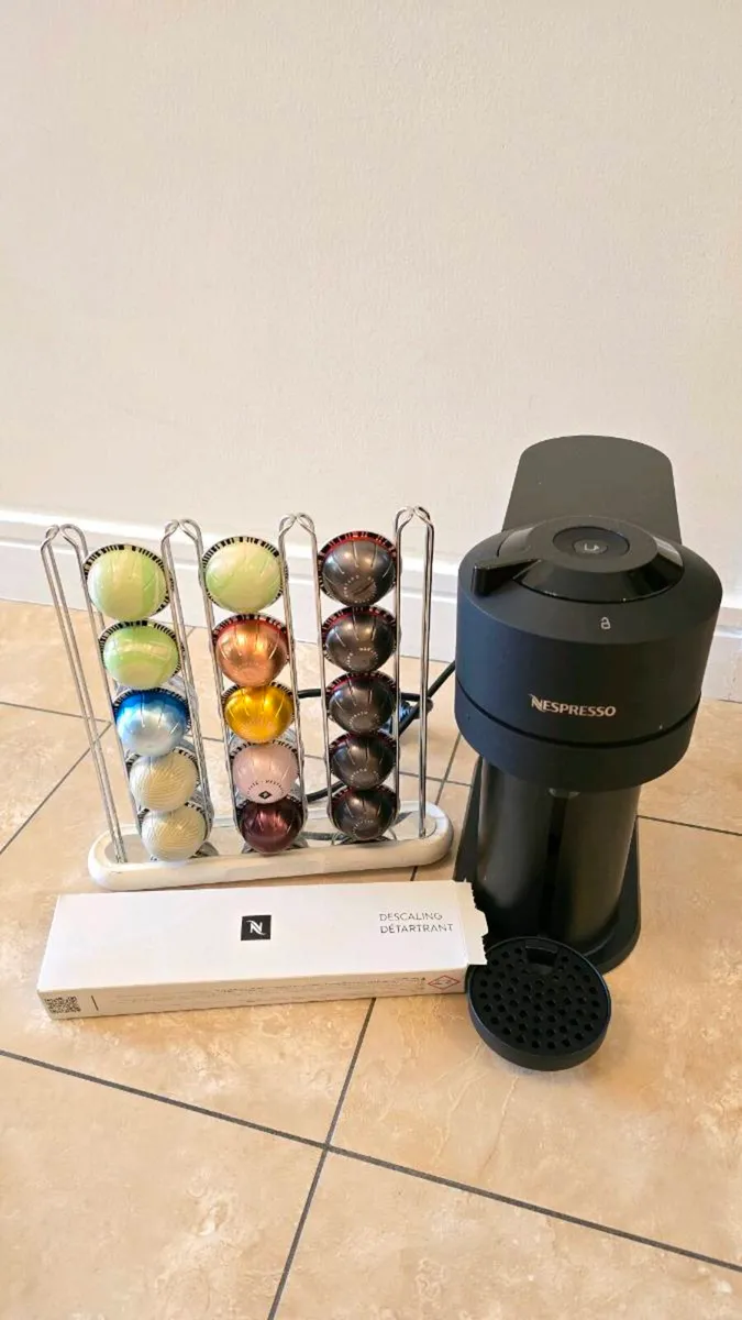 Nespresso Vertuo Next coffee machine with holder - Image 1