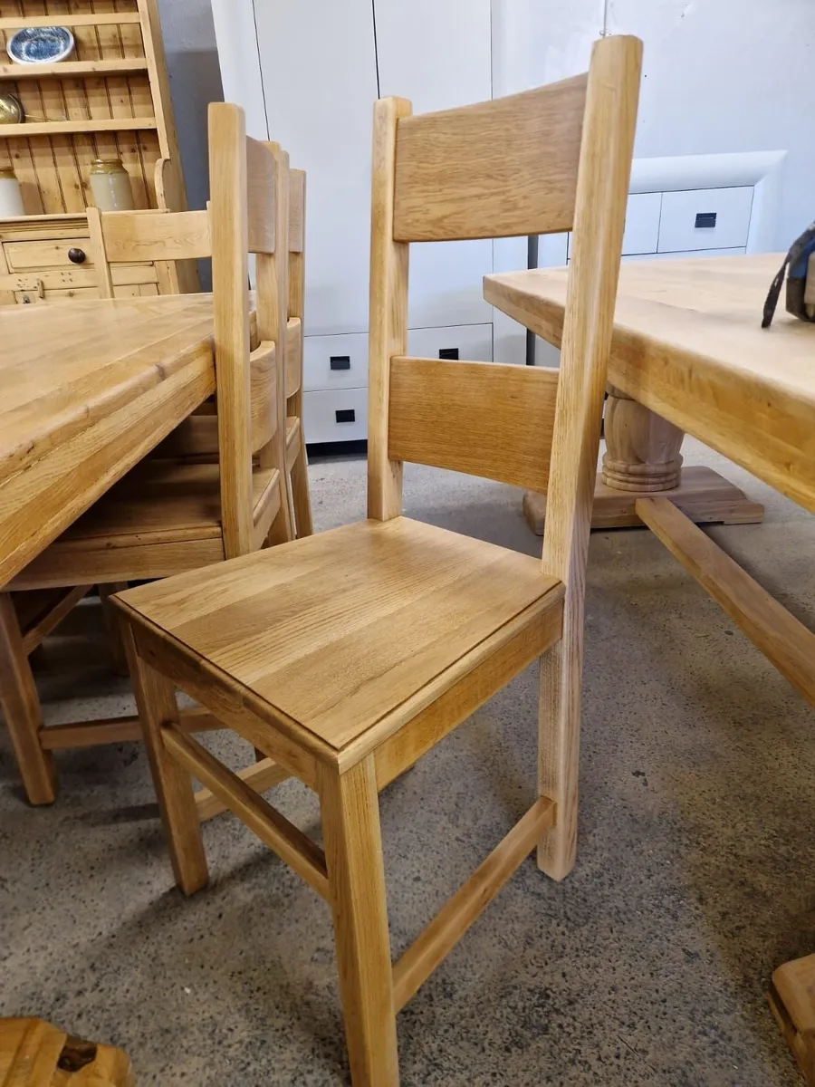 7ft, 8 inches oak trestle table, 8 oak chairs - Image 2