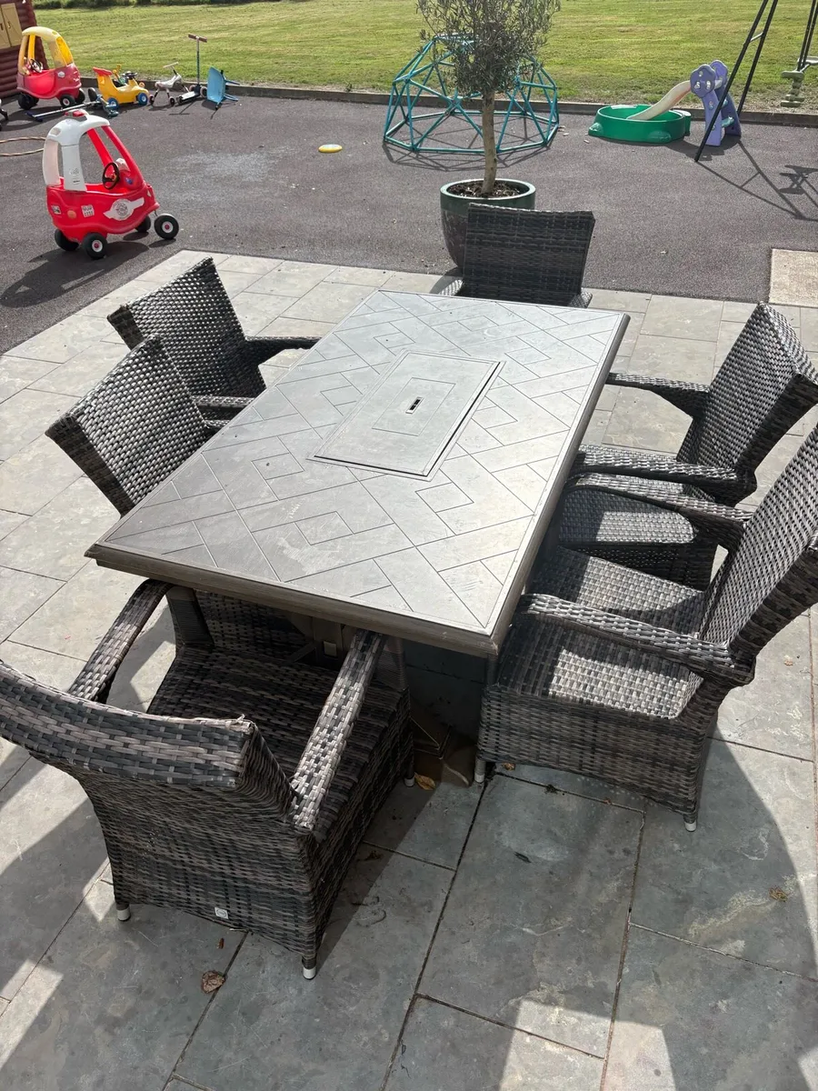 Patio Table with built in heater, 6 chairs - Image 1