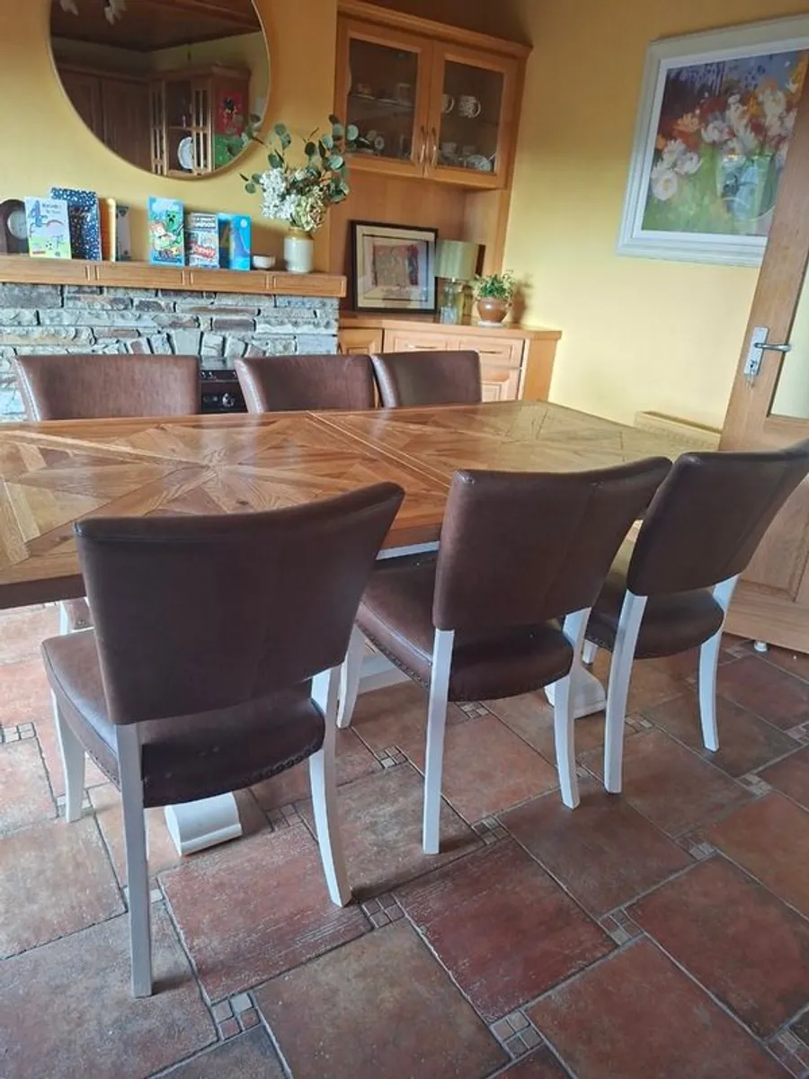 Extendable dining table and chairs. - Image 1