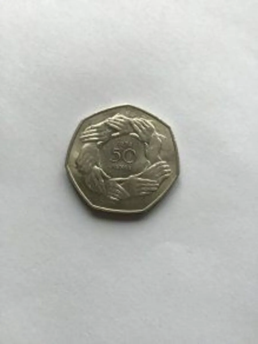 1973 English Circle of Hands 50 pence coin
