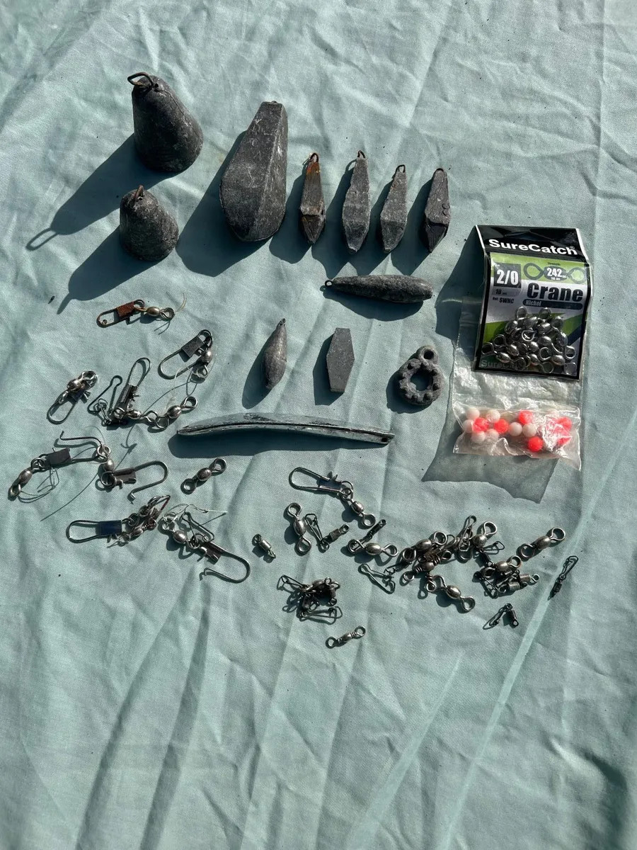 Selection of lead weights for sea fishing.