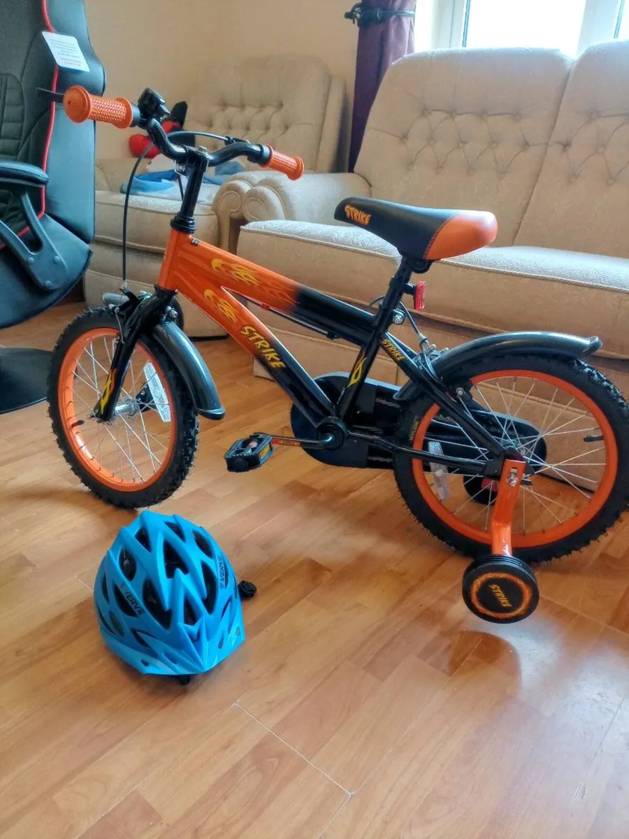 Bike brand new never used with helmet - Image 1