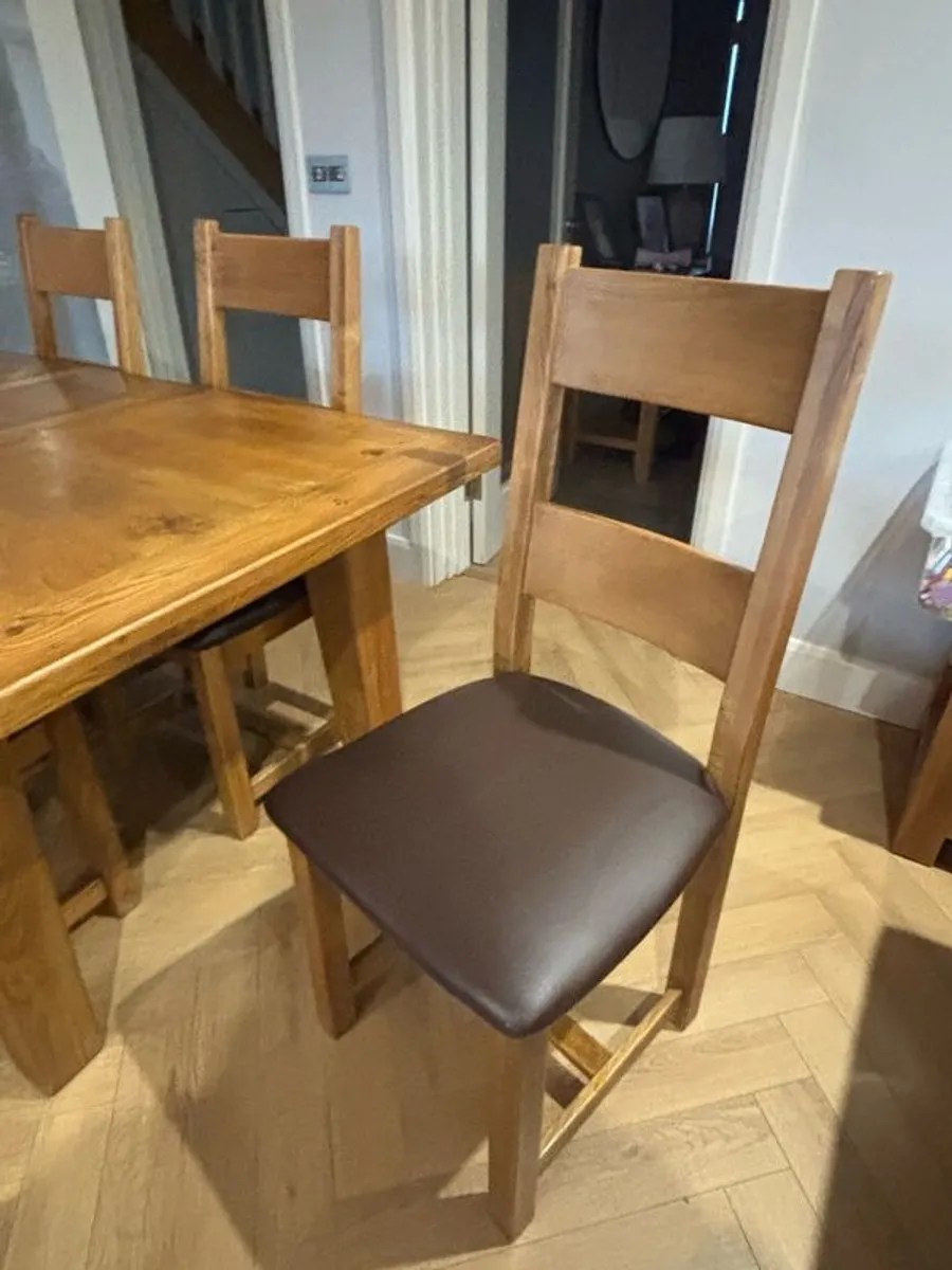 Extendable Solid Oak Dining Table & 6 leather dining chairs - Image 2