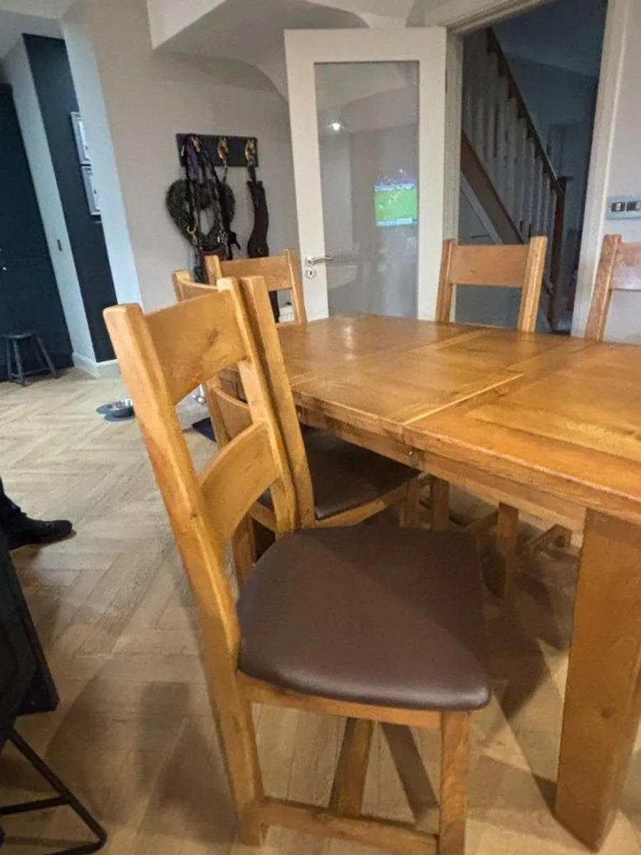 Extendable Solid Oak Dining Table & 6 leather dining chairs - Image 3