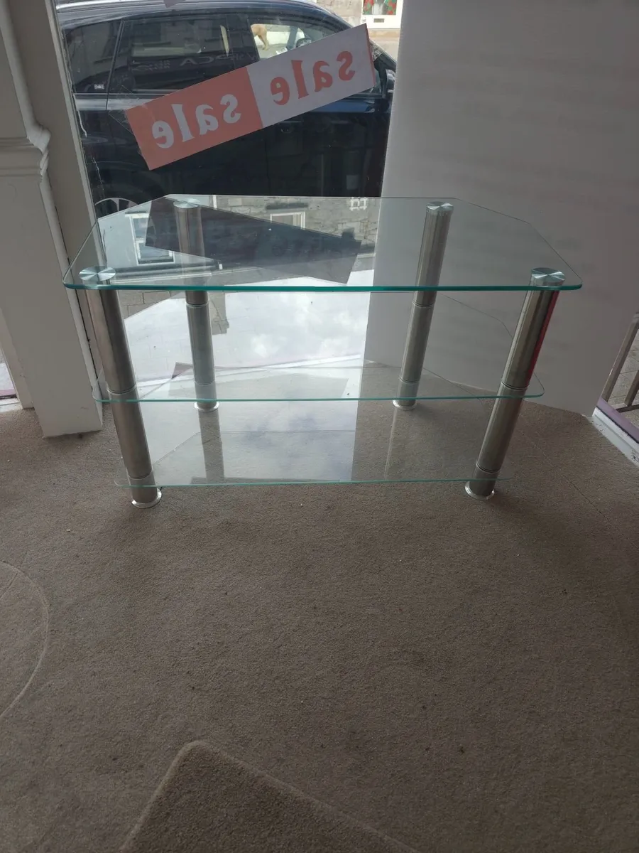 TV stand  glass and chrome. - Image 1