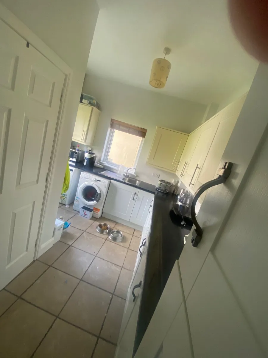 Utility cupboards and work top and sink and drain - Image 1
