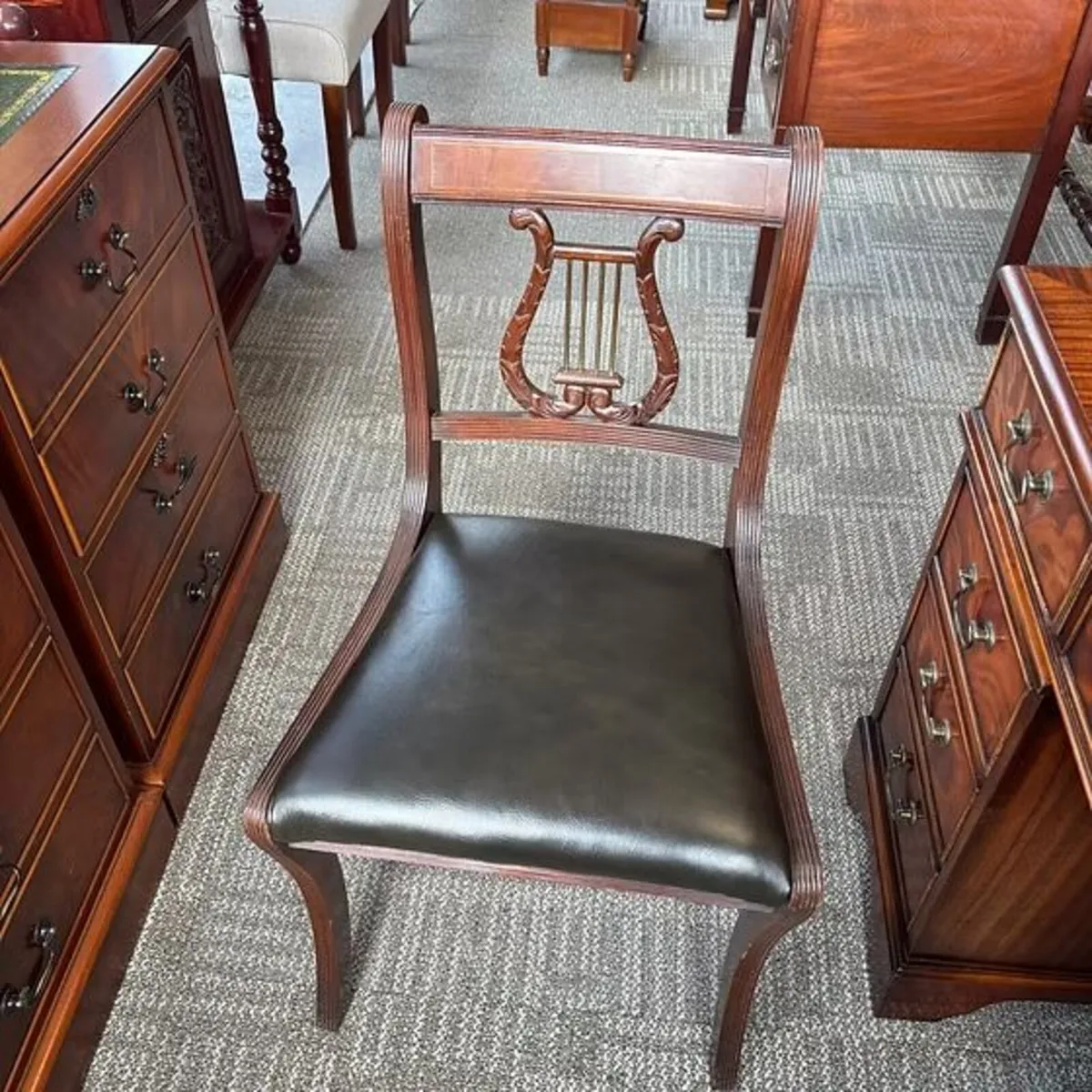 Classic regency-style mahogany occasional chair wi
