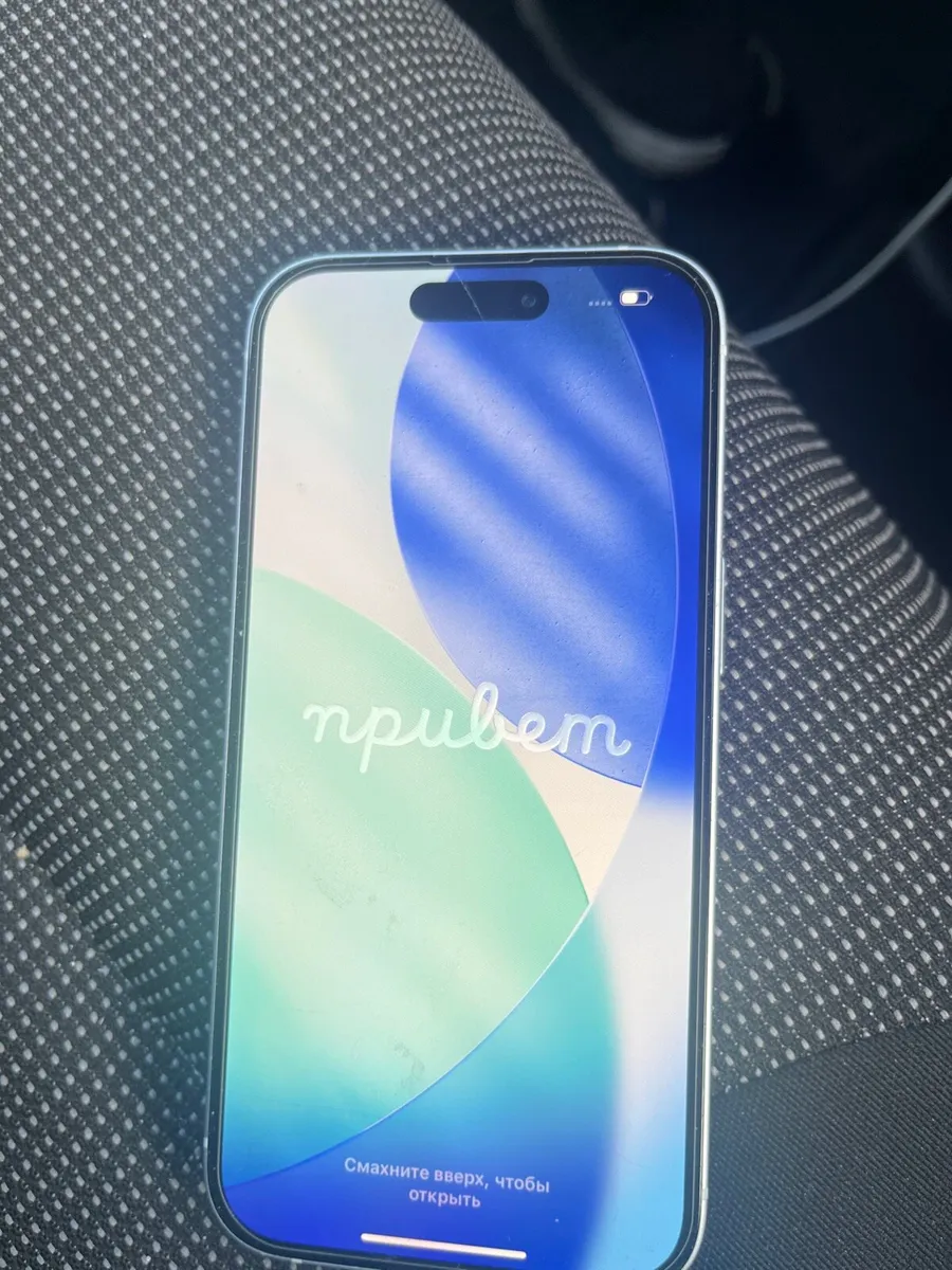 iPhone 15 has very small crack on top off screen - Image 1
