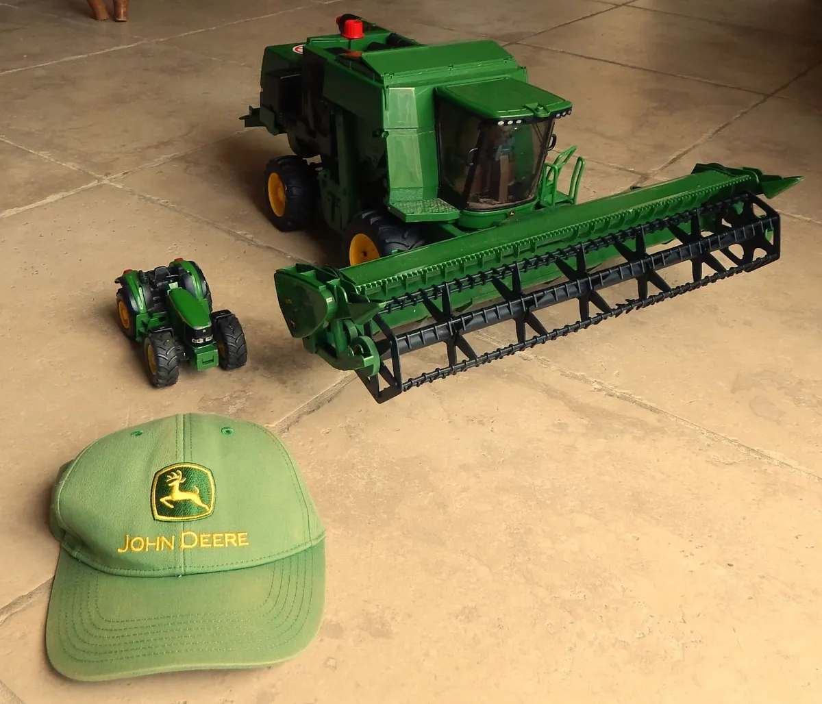 John Deere Toy Models of Combine and Tractor - Image 1