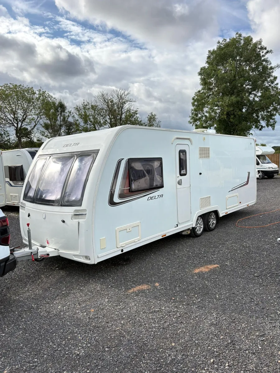 2014 Lunar 4 Berth Fixed Island Bed Caravan - Image 1