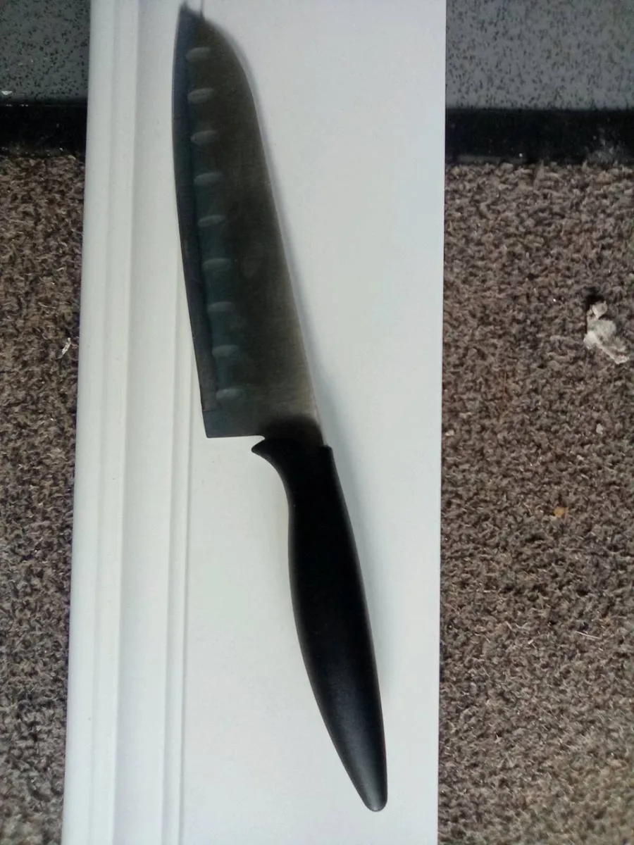 NEW.  KITCHEN.   KNIFE.