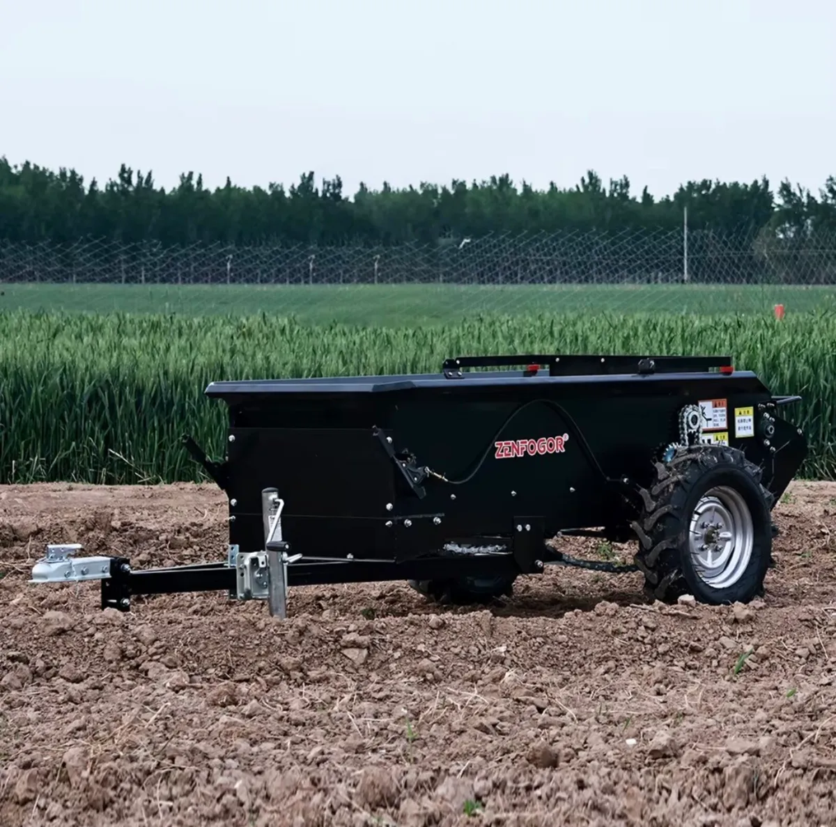 Ground driven muck spreader for quad