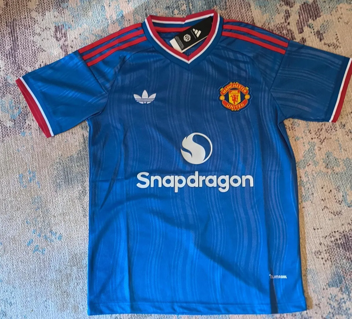 Man United home and away jerseys season - Image 1