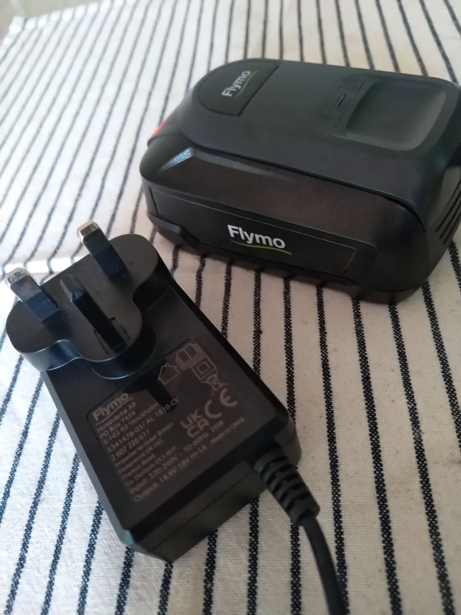 Flymo charger +battery - Image 1