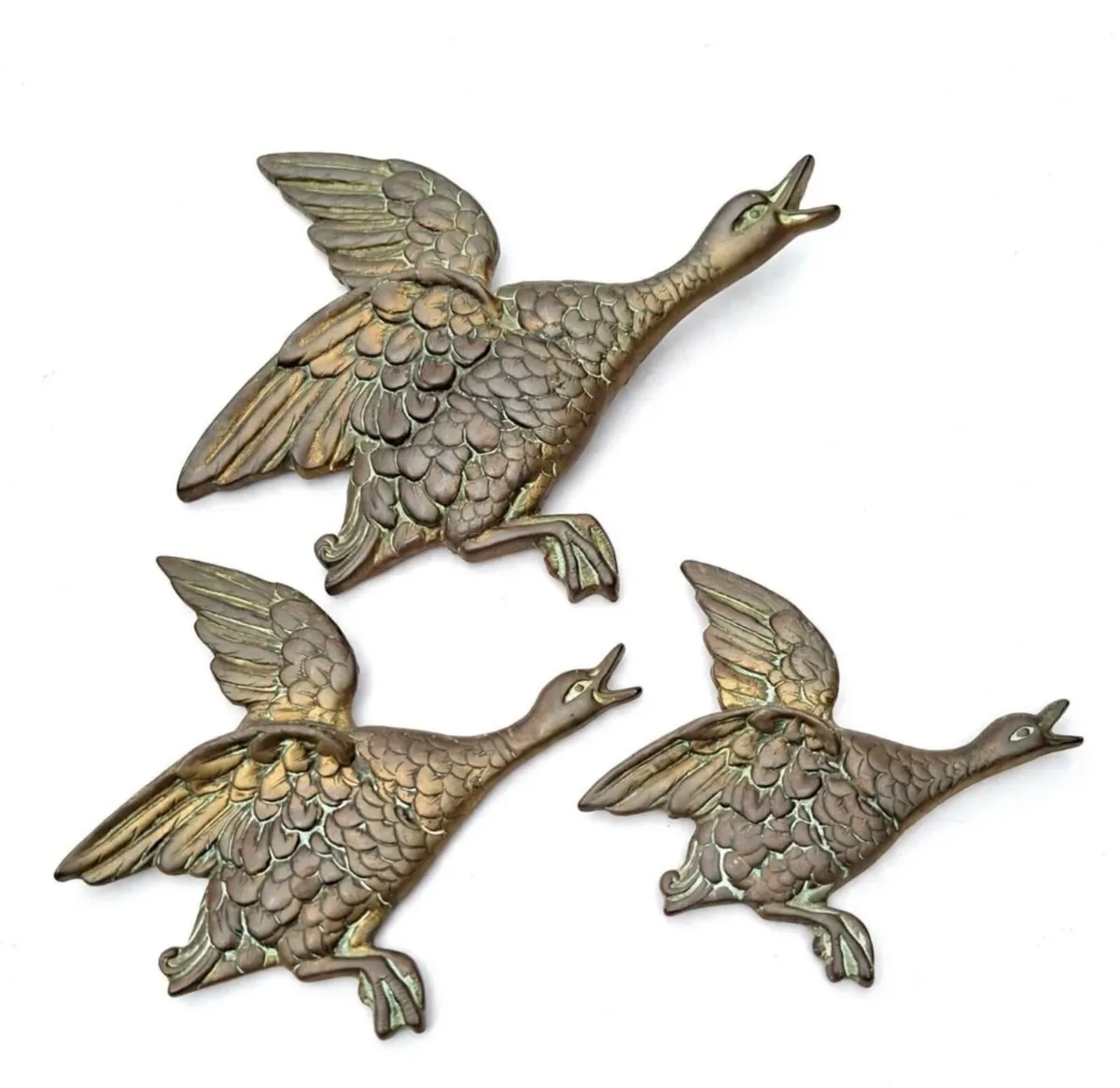 Vintage brass flying ducks
