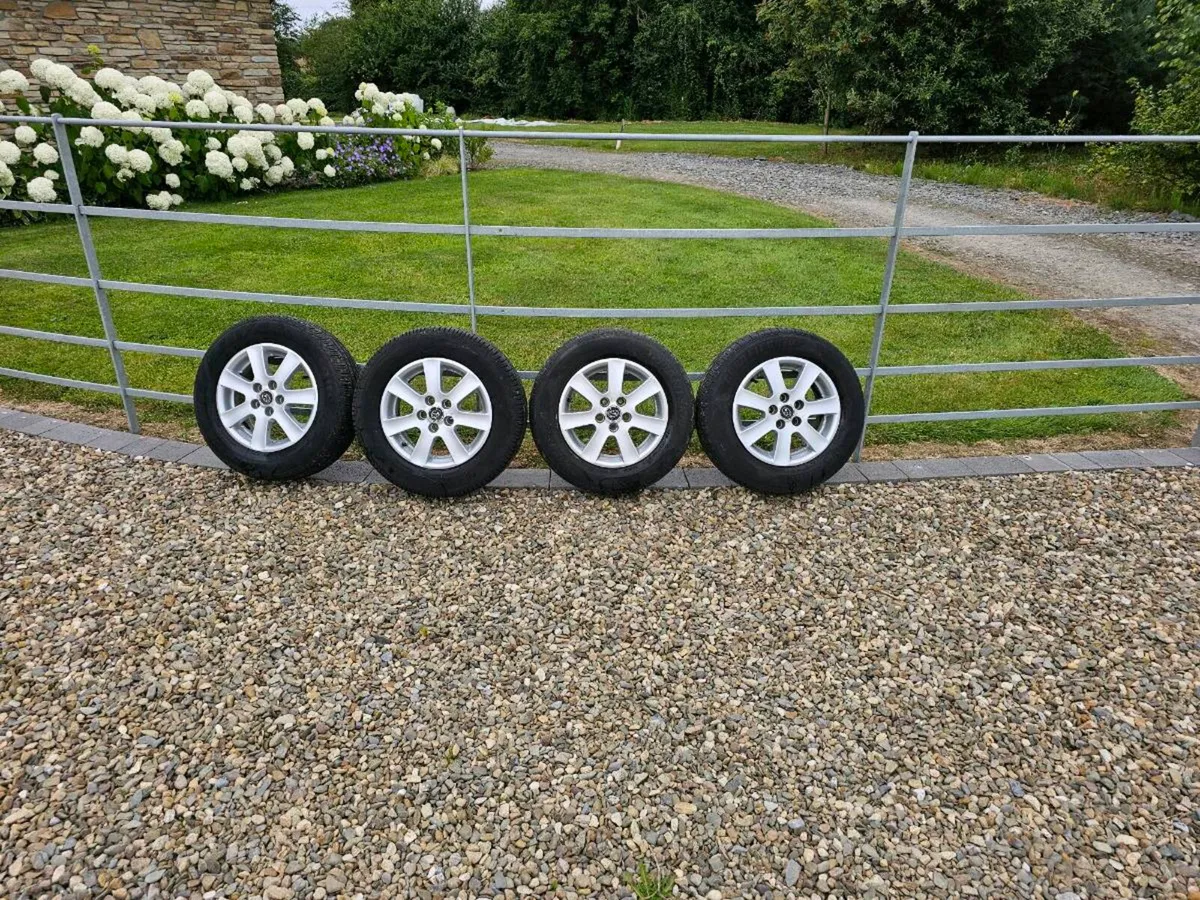 4 OEM Subaru 14" Alloy Wheels & Tires – 5x100 - Image 1