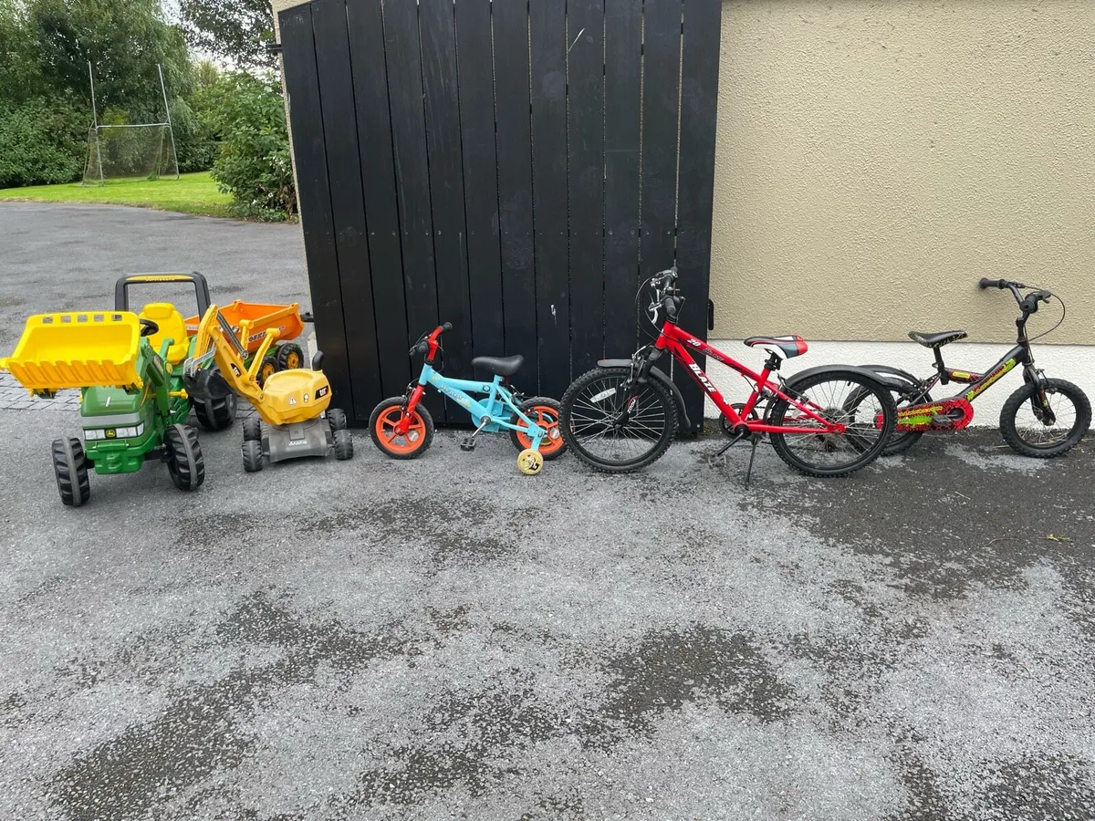 Kids john deere tractor and bikes - Image 1