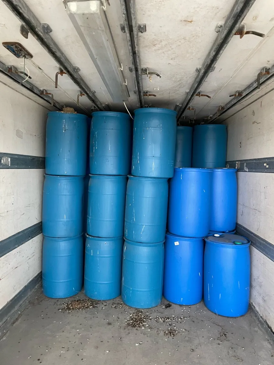 Job lot blue plastic barrels
