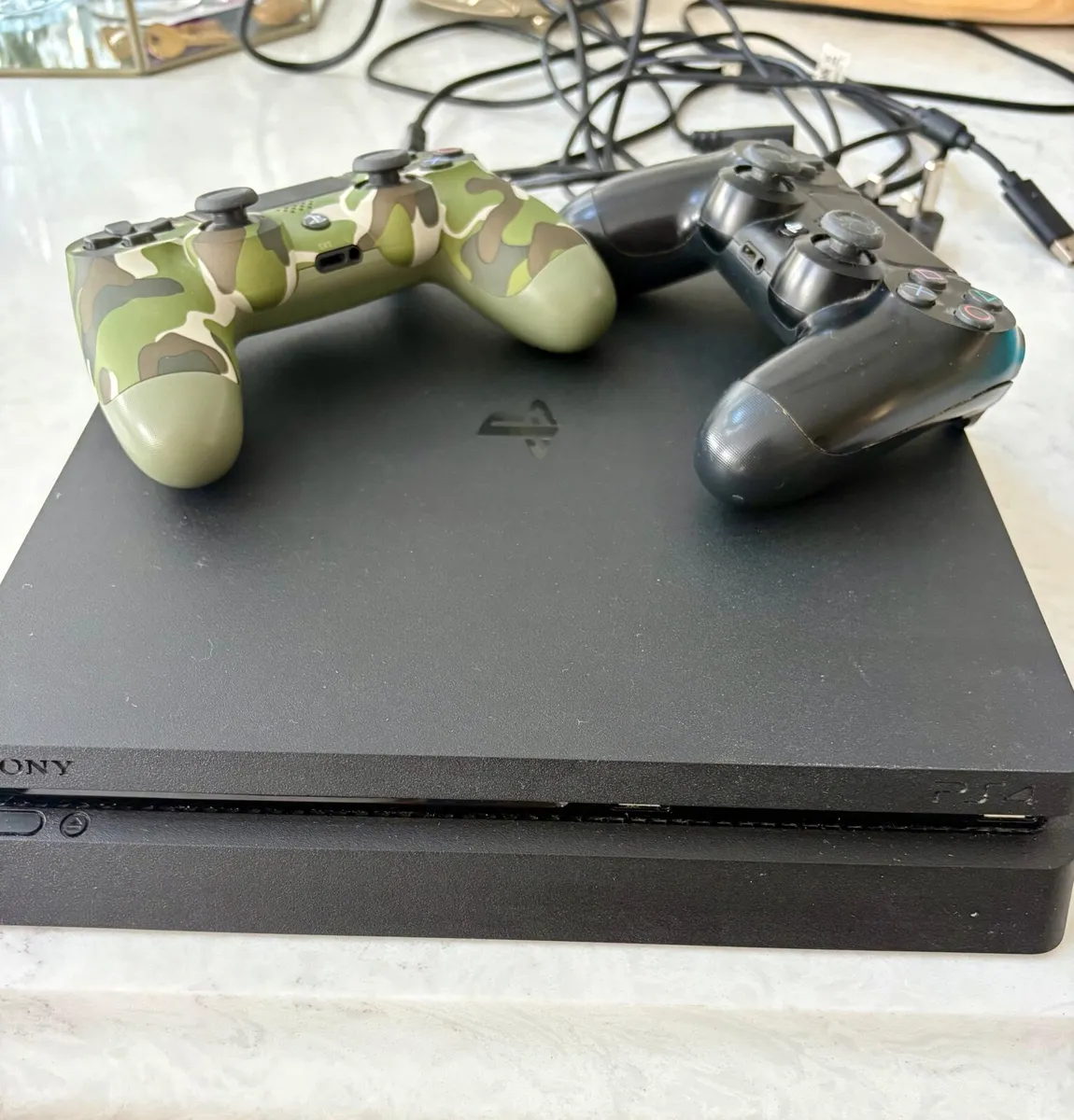 PS4 console & 2 controllers - Image 1
