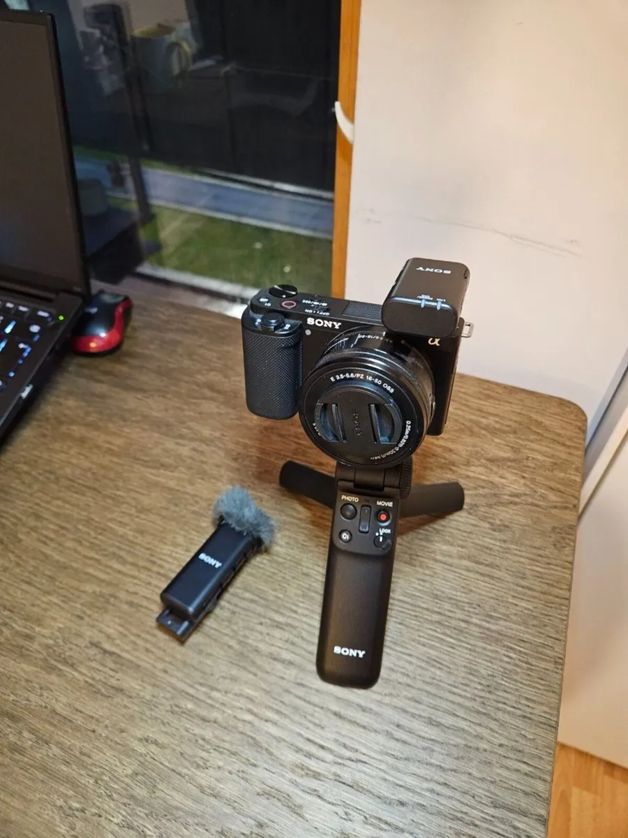 Sony ZV-E10 Camer Lens, Wireless Mic, Tripod/Grip - Image 1