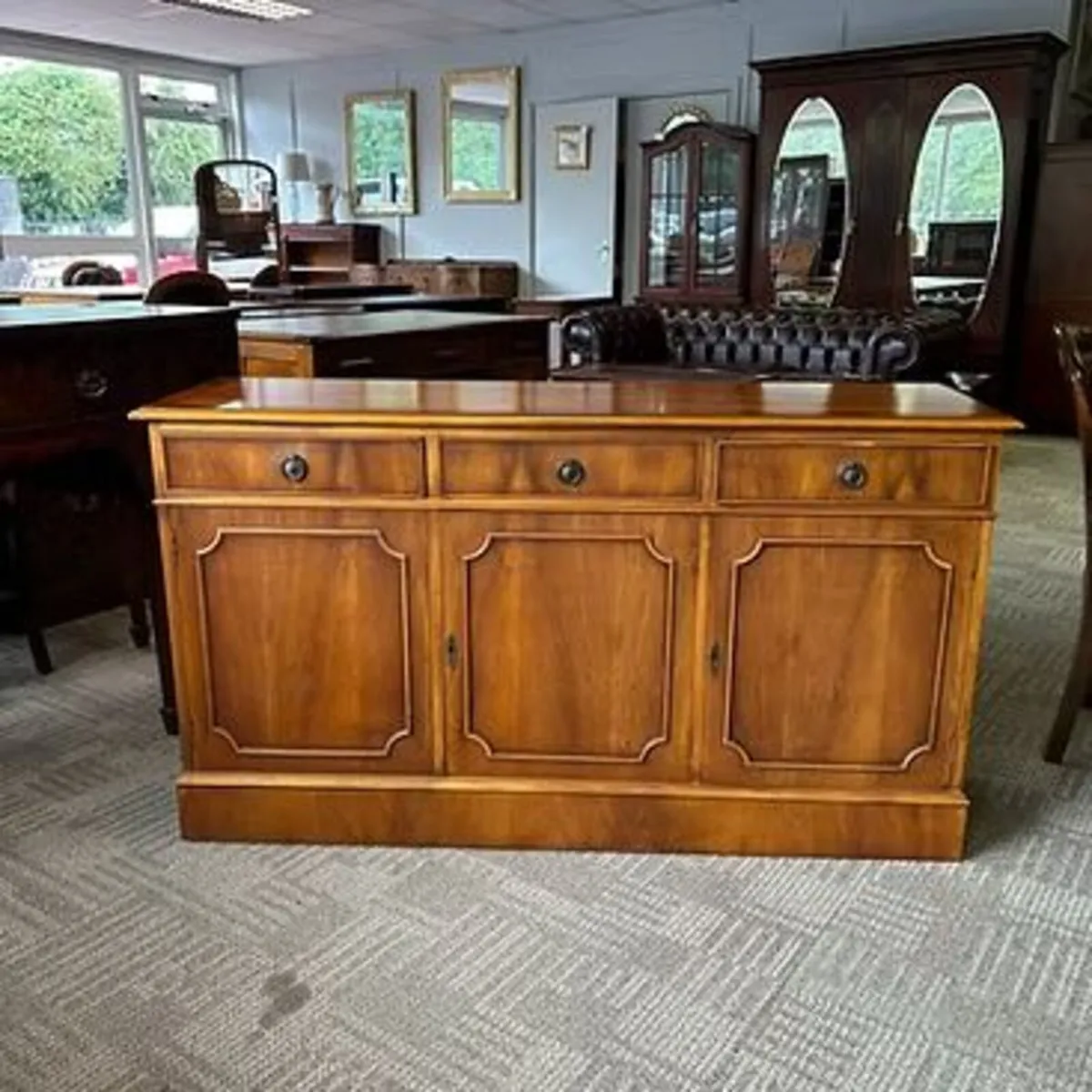 Fabulous three door yew flamed sideboard