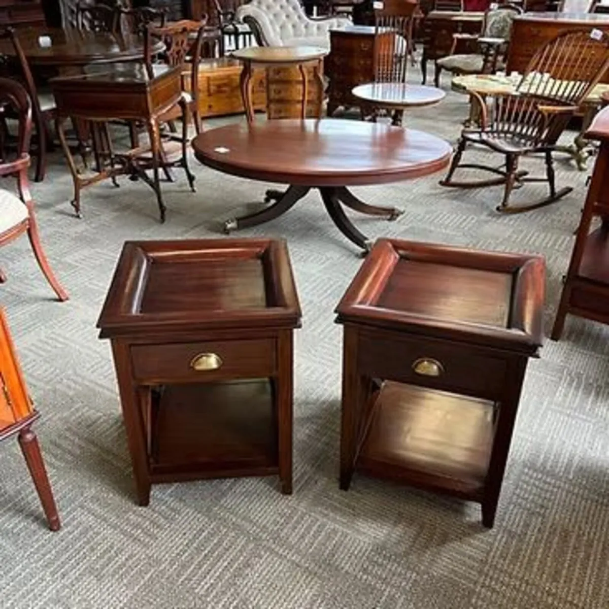 Handsome pair of mahogany side tables