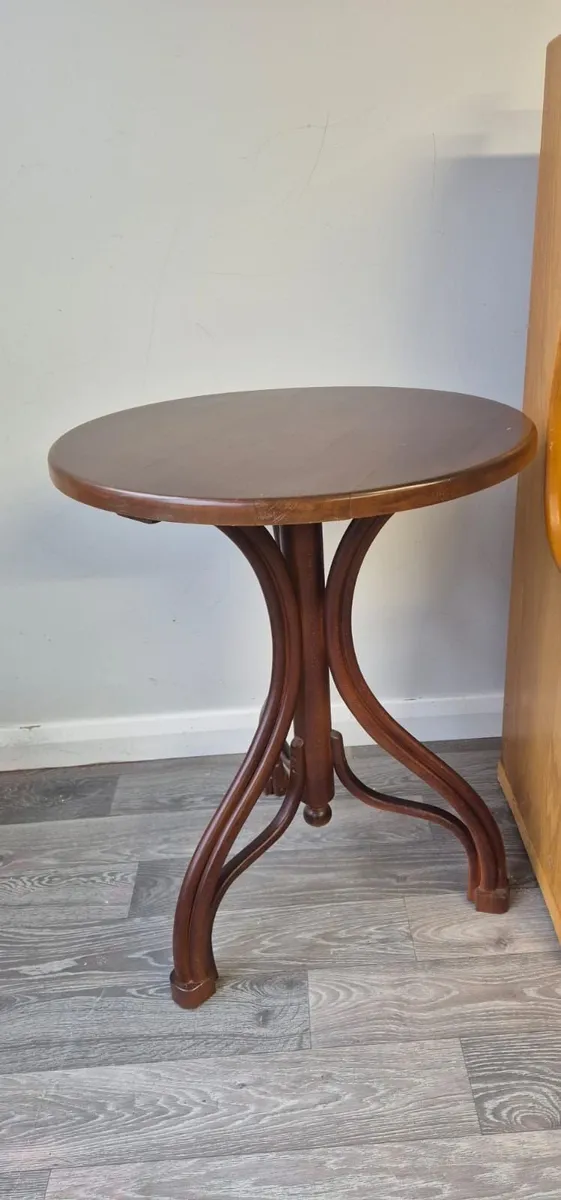 Bar seating and table. - Image 2
