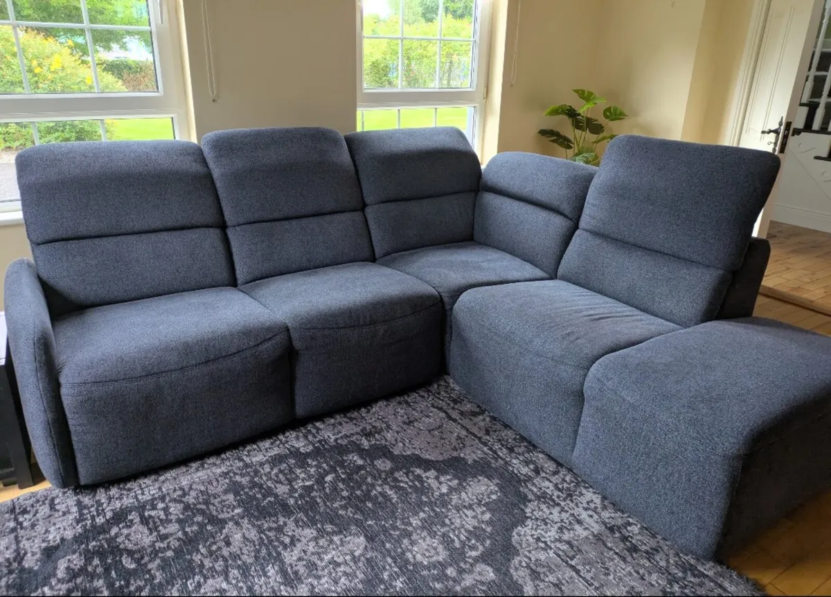 Corner couch with pull out bed and storage - Image 1