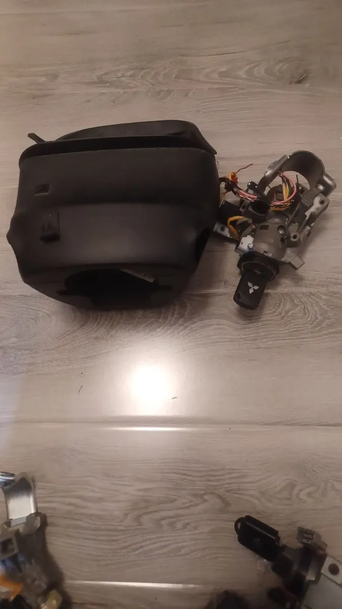 Mitsubishi Mirage ignition and cover