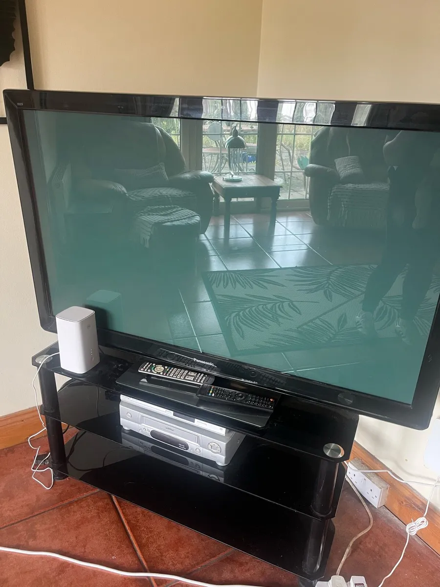 Panasonic Television & Stand/DVD Player - Image 1