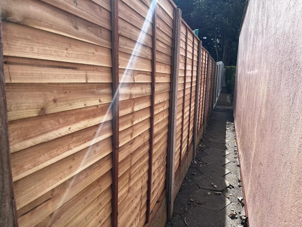 Fencing, concrete poles, timber panels - Image 3