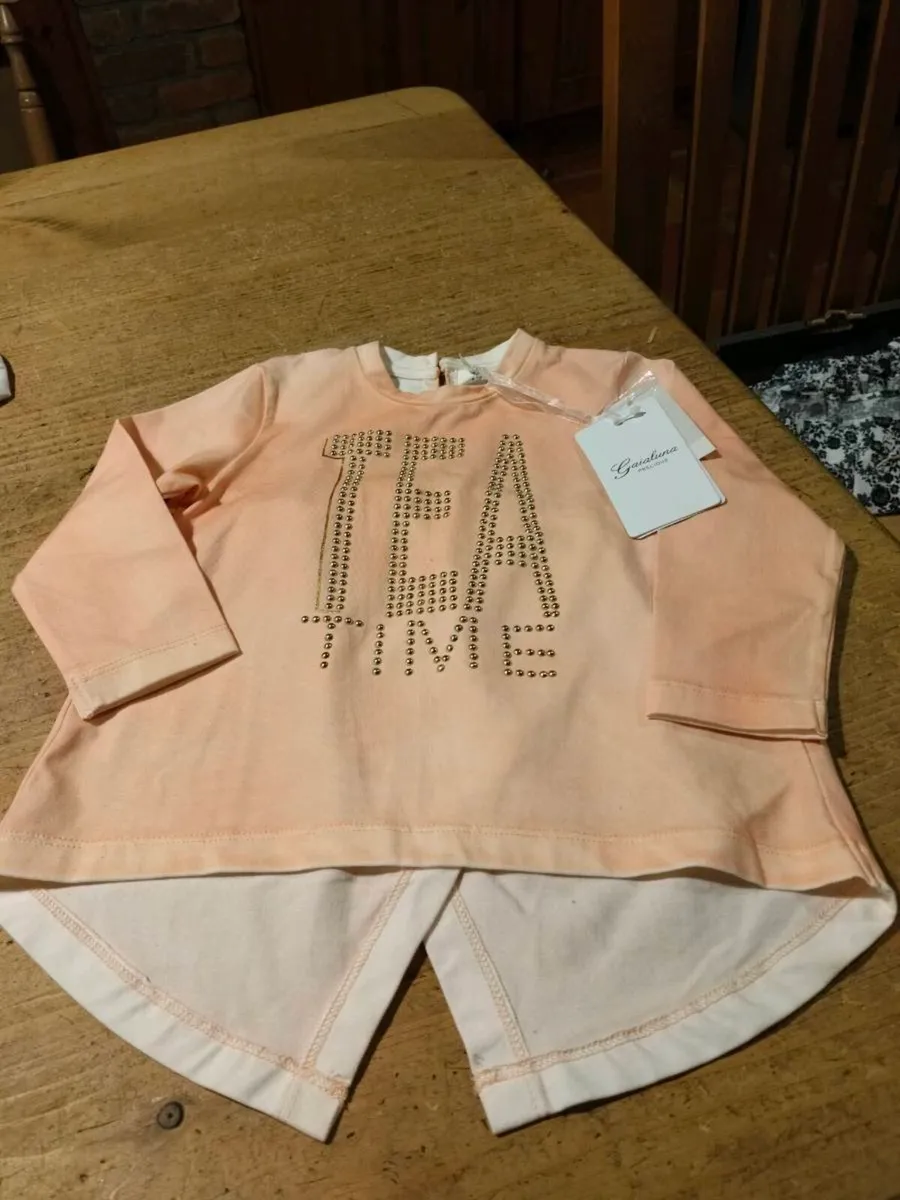 This is a Gaialuna peach-colored long-sleeve top f - Image 1