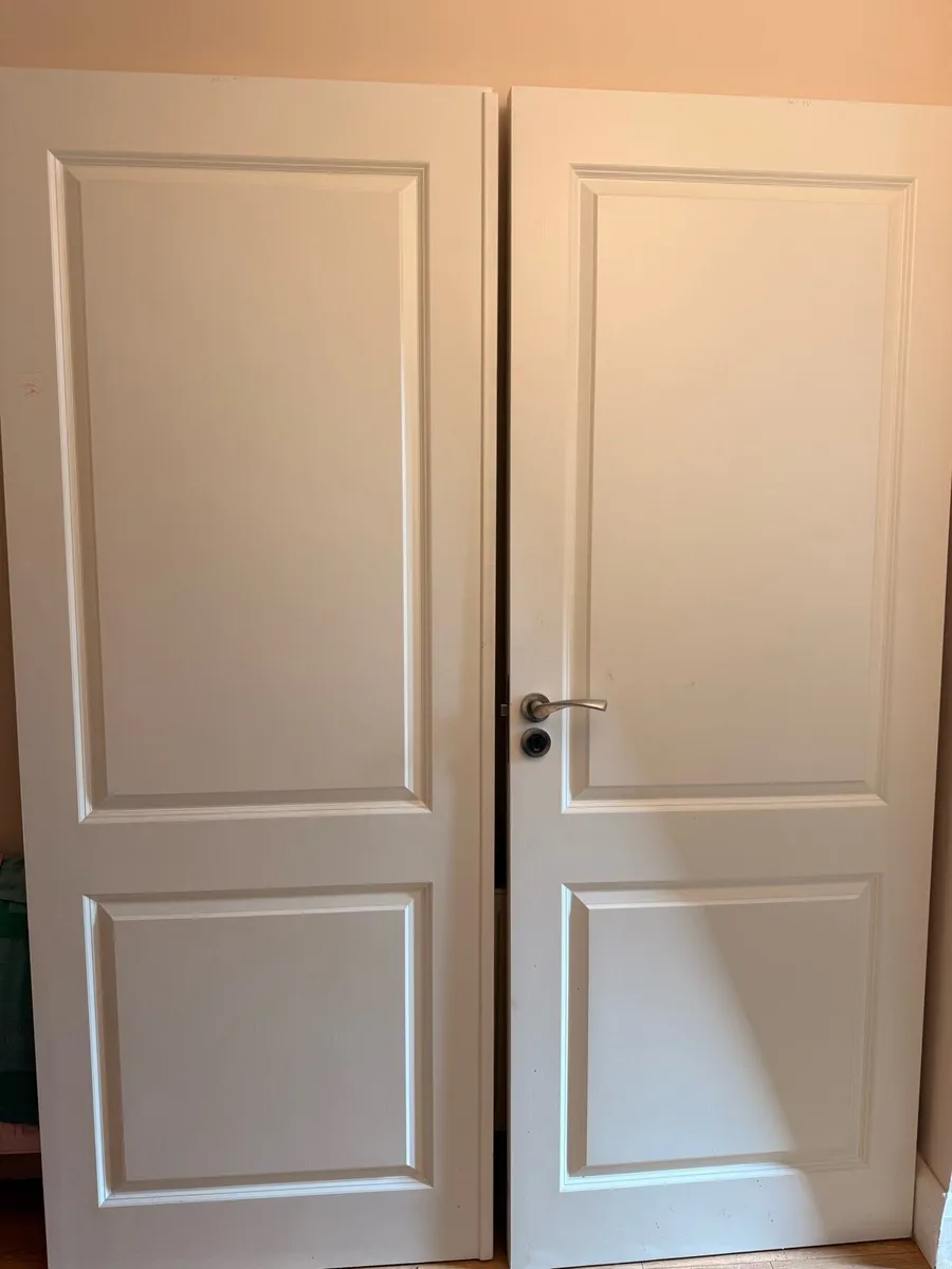 2 x Primed White internal panel doors - Hardware - Image 1
