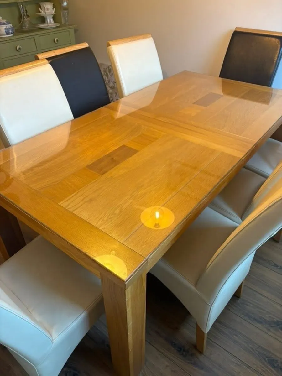Dining table and 8 chairs - Image 1