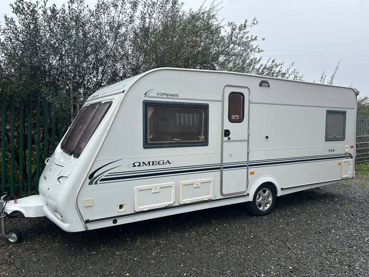 2007 compass Omega caravan 4/5 berth fixed bed - Image 1