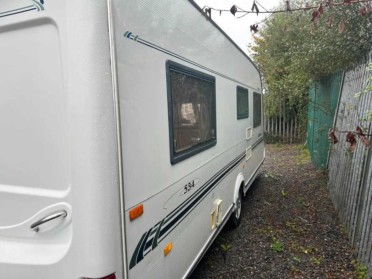 2007 compass Omega caravan 4/5 berth fixed bed - Image 4
