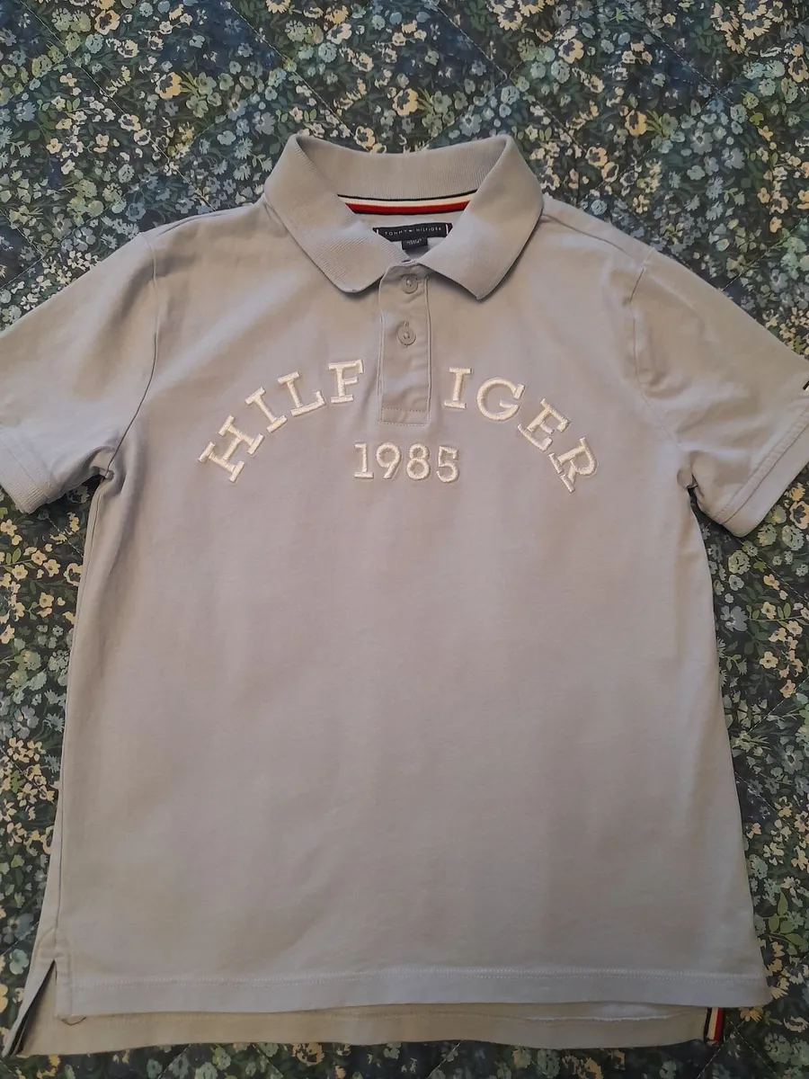 Boys baby blue Tommy Hilfiger polo top 8/10yrs - Image 1