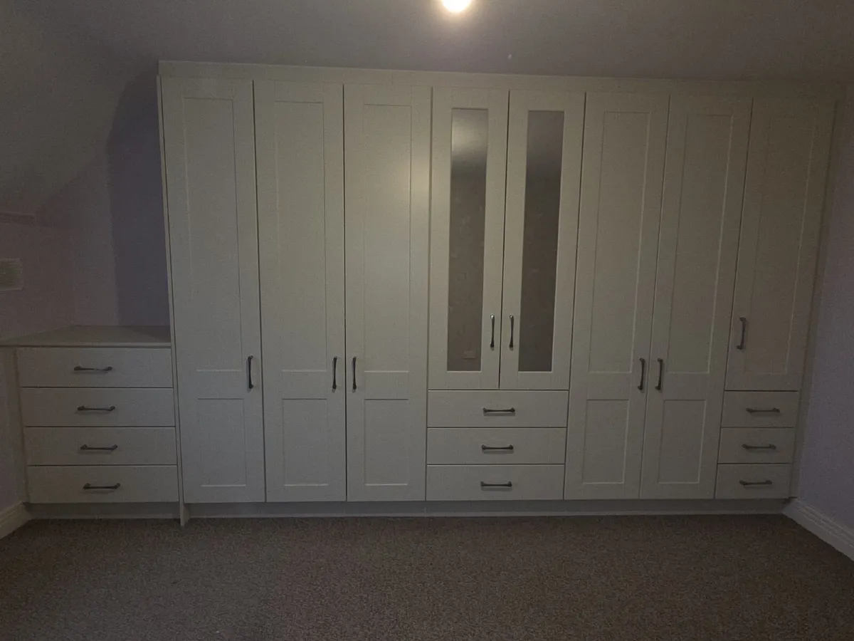 Shaker-style, cream-coloured, fitted  wardrobes - Image 1