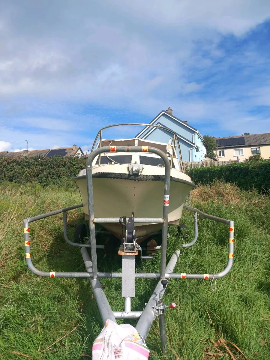 Boat engine and trailer for sale - Image 1